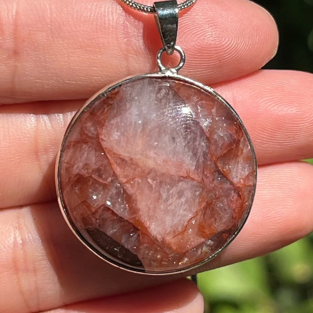 Silver‎ plated round fire Quartz pendant